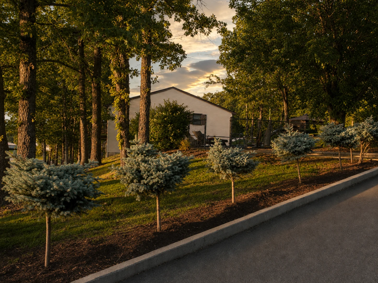 Landscaped Morningside Village grounds and apartment building at sunset