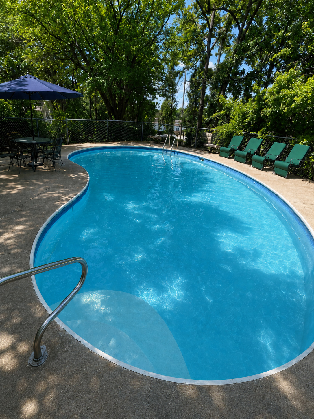 The private swimming pool at Morningside Village on a sunny summer day