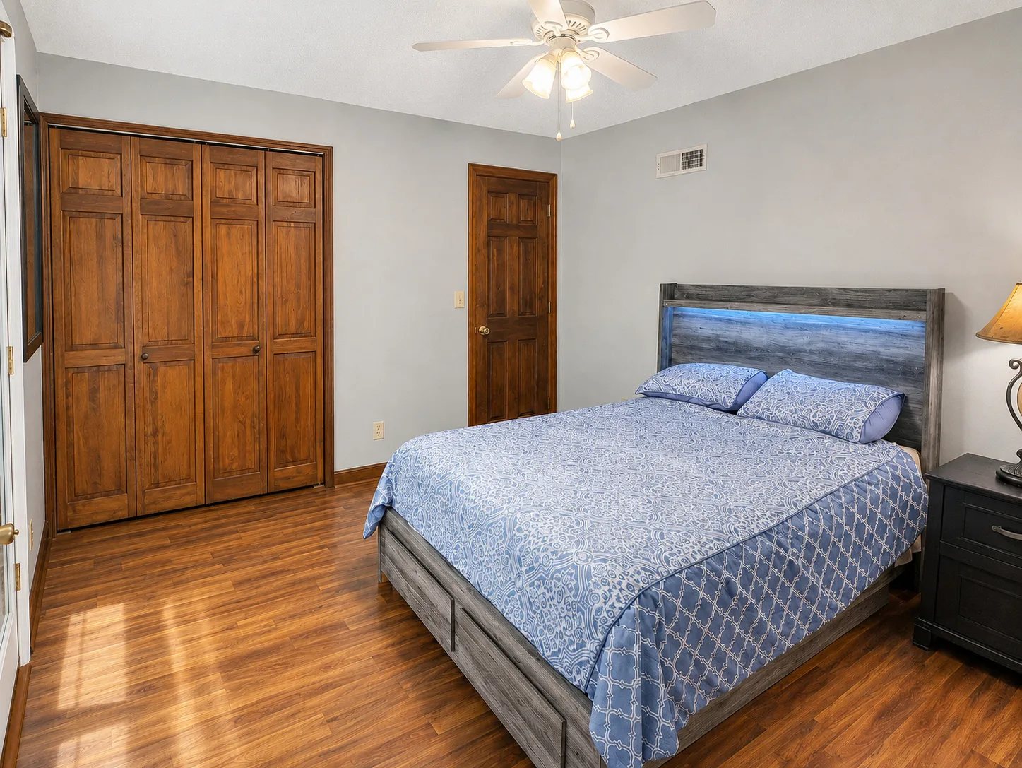 Furnished primary bedroom in apartment 1301 B