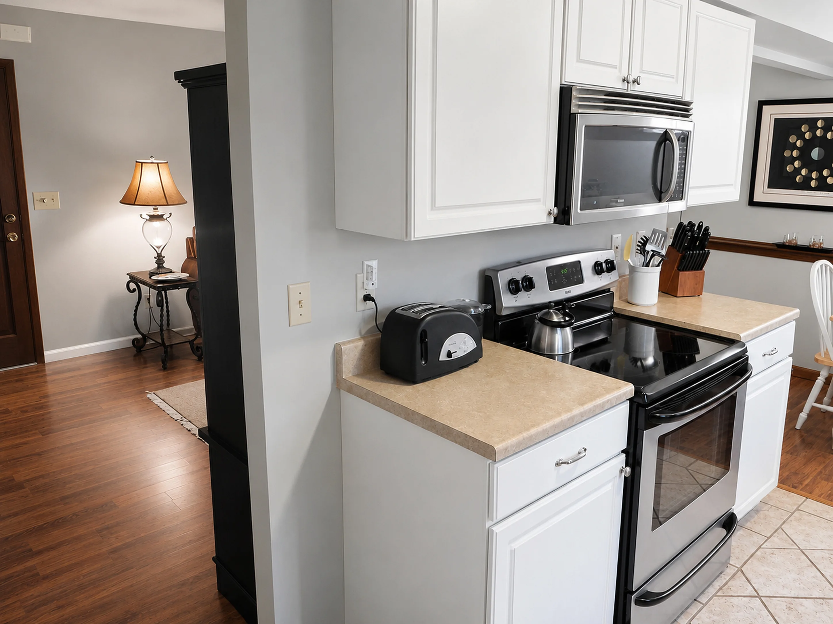 Kitchen range and dining area in apartment 1307 B